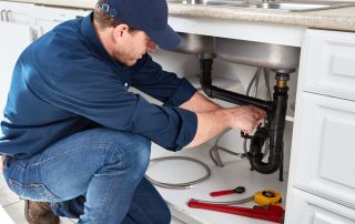 Plumber Working Under Sink in Murfreesboro, TN